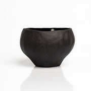    Handmade black stoneware sake cups with matte exterior and glossy glazed interior.