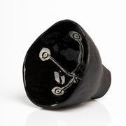     Handmade black stoneware snack bowl with unique hand-painted interiors.