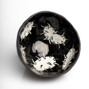     Handmade black stoneware snack bowl with unique hand-painted 