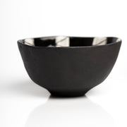     Handmade black stoneware snack bowl with unique hand-painted interiors.