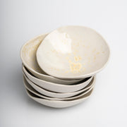     Handmade porcelain mini bowls with pearlescent glazed interio