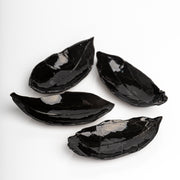     Handmade black leaf dish with glossy glaze.