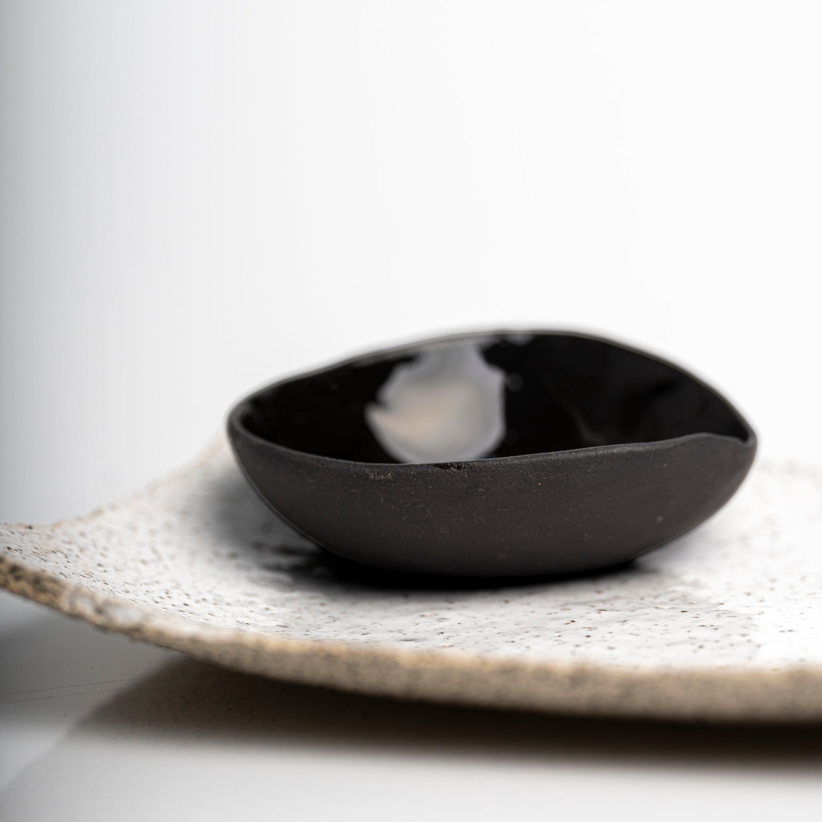     Small handcrafted stoneware bowl for salt, soy sauce or olive oil.