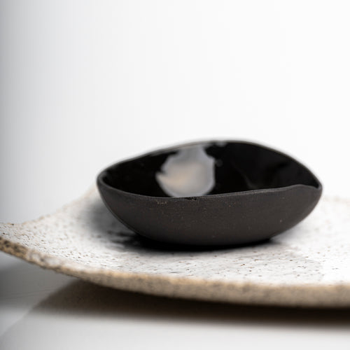     Small handcrafted stoneware bowl for salt, soy sauce or olive oil.